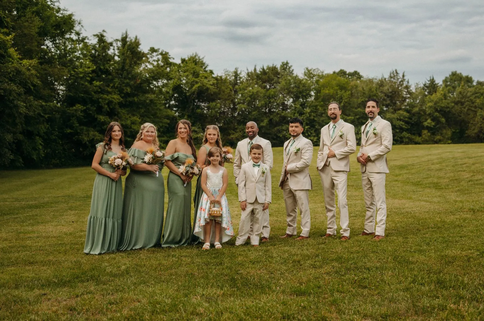 The wedding party gathered on the grounds of The Heritage Barn in Conover, NC